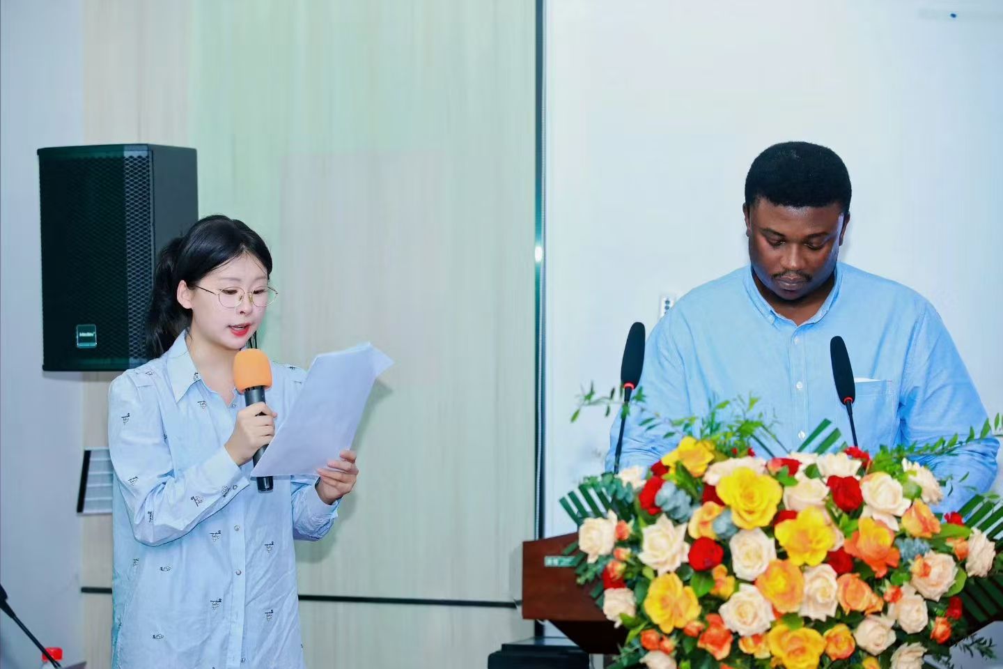 Shuhan providing Chinese-English interpretation